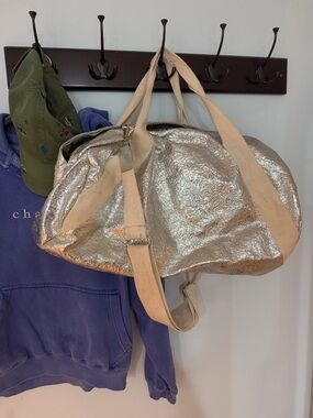 Silver Metallic Cha Cha Canvas Weekend Duffel Bag by Anthropologie